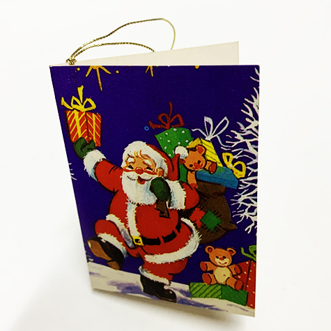 carta Biglietto chiudipacco con filo, BabboNatale completo di bustina in carta. Formato cm 4,7x6,8cm. Stampa offset su cartoncino bianco liscio. Cordoncino dorato in dotazione all'interno..