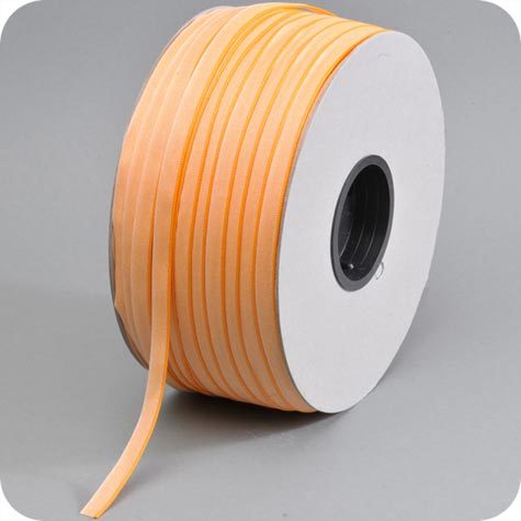 legatoria Capitello ARANCIONE avvolto per il lato destro, larghezza 13 mm.