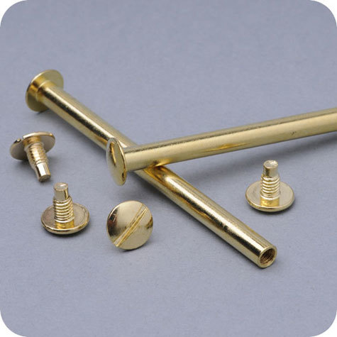 legatoria Viti sepolte rilegatura, OTTONATE, 115mm lunghezza 115 mm, testa diametro 10mm, tubetto diametro 5mm, una testa fissa ed una mobile. Per lunghezza, si intende la distanza INTERNA tra le due teste, che corrisponde allo spessore del volume da rilegare.