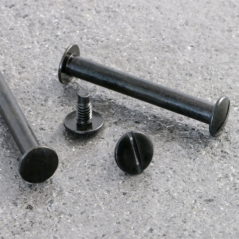 legatoria Viti sepolte rilegatura verniciate, 60mm NERO, in metallo verniciato, lunghezza mm 60. Viti con zincatura nera. Testa diametro 10mm, tubetto diametro 5mm, una testa fissa ed una mobile. Per lunghezza, si intende la distanza INTERNA tra le due teste, che corrisponde allo spessore del volume da rilegare.