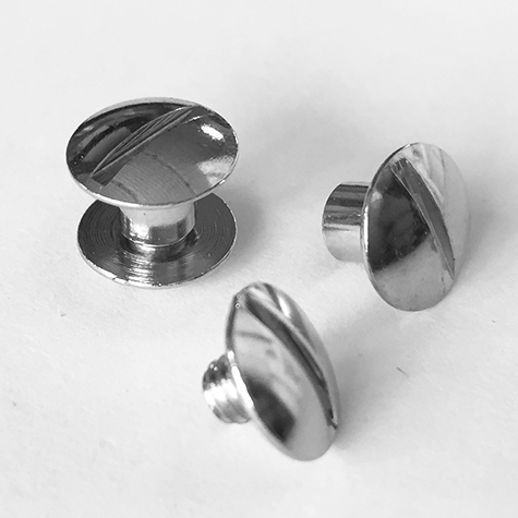 legatoria Viti sepolte rilegatura, NICHELATE, 6mm lunghezza mm 6, testa diametro 10mm, tubetto diametro 5mm, una testa fissa ed una mobile. Per lunghezza, si intende la distanza INTERNA tra le due teste, che corrisponde allo spessore del volume da rilegare.