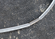 legatoria Anello elastico rivestito in tessuto, 410mm ARGENTO, spessore 2mm, le due estremit sono congiunte con una chiusura metallica per formare un anello che ben si adatta a rilegare fogli formato A5 (210mm).