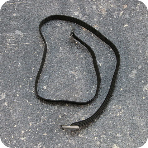 legatoria Elastico piatto con 2 capicorda. lunghezza 230mm NERO, lunghezza 230mm (compresi i 2 capicorda), elastico a sezione piatta 5x1mm,  rivestito in tessuto.