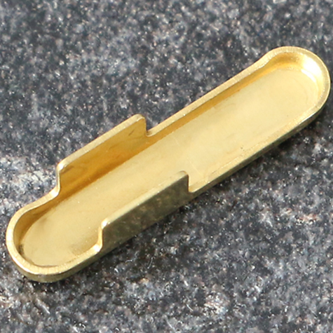legatoria Capicorda a -T- per elastico o cordoncino OTTONATO, lunghezza 14,3mm. Larghezza 3,2mm. Spessore 3,5mm. Per elastico di spessore fino a 3mm..