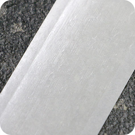 legatoria Nastro biadesivo fingerlift, 12mm PERMANENTE-REMOVIBILE, il nastro biadesivo da 12mm  adagiato su un nastro di supporto siliconato da 18mm. Una volta applicato, il supporto siliconato si stacca facilmente con laiuto di un unghia. In rotolo da 500m.