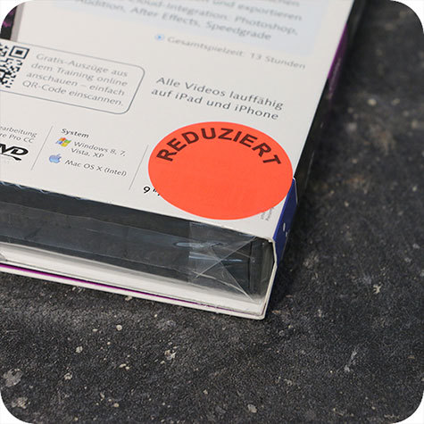 legatoria Bollini autoadesivi in tessuto con testo - Reduziert ROSSO FLUORESCENTE, diametro 30mm, adesivo permanente, in rotolo.