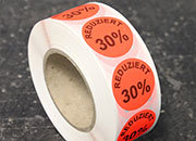 legatoria Bollini autoadesivi in tessuto con testo - Reduziert 30% ROSSO FLUORESCENTE, diametro 30mm, adesivo permanente, in rotolo.