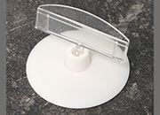 legatoria Porta cartellino con clip 55x50mm TRASPARENTE. Con base cilindrica  AUTOADESIVA di 55mm e clip di ancoraggio snodabile. Altezza 50mm LEG3619