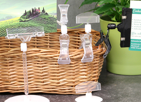 legatoria Porta cartellino con clip 55x50mm TRASPARENTE. Con base cilindrica  AUTOADESIVA di 55mm e clip di ancoraggio snodabile. Altezza 50mm.