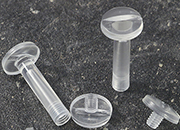 legatoria Vite sepolta rilegatura TRASPARENTE 25mm lunghezza mm 25, diametro testa 12mm, lunghezza mm , diametro tubetto 5mm, una testa fissa ed una mobile, LVI6103. Per lunghezza, si intende la distanza INTERNA tra le due teste, che corrisponde allo spessore del volume da rilegare.