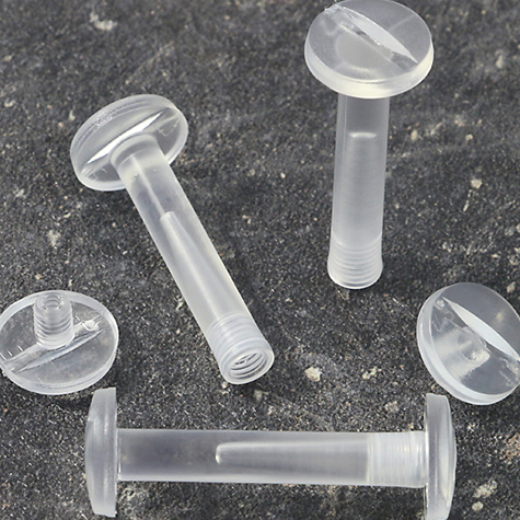 legatoria Vite sepolta rilegatura TRASPARENTE 30mm lunghezza mm 30, diametro testa 12mm, lunghezza mm , diametro tubetto 5mm, una testa fissa ed una mobile, LVI6103. Per lunghezza, si intende la distanza INTERNA tra le due teste, che corrisponde allo spessore del volume da rilegare.