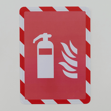 legatoria Cornice per segnalazioni antinfortunistiche, A4 ROSSO-BIANCO. AUTOADESIVA mediante nastro biadesivo in schiuma di PE, largo: 19mm, spessore: 1mm. Il foglio protettivo trasparente antiriflesso  adeso con nastro magnetico di larghezza 7 mm. Per fogli di dimensione A4 (210x297mm). Dimensioni esterne: 230x318mm. Area visibile: 200x288. Altezza profilo: 25mm..