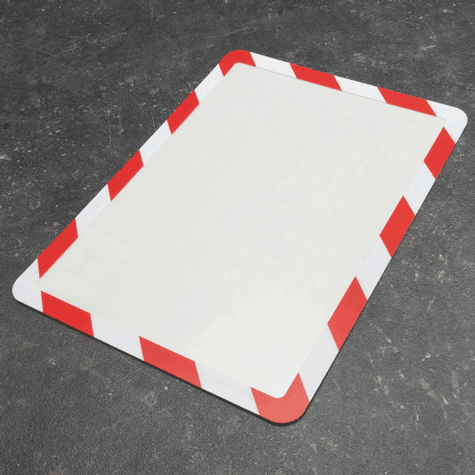 legatoria Cornice per segnalazioni antinfortunistiche, A4 ROSSO-BIANCO. AUTOADESIVA mediante nastro biadesivo in schiuma di PE, largo: 19mm, spessore: 1mm. Il foglio protettivo trasparente antiriflesso  adeso con nastro magnetico di larghezza 7 mm. Per fogli di dimensione A4 (210x297mm). Dimensioni esterne: 230x318mm. Area visibile: 200x288. Altezza profilo: 25mm..