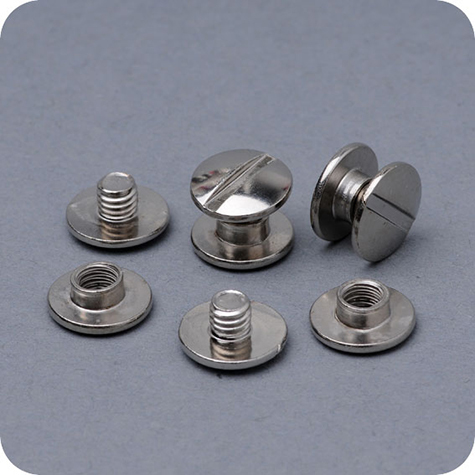 legatoria Viti sepolte rilegatura, NICHELATE 3mm lunghezza mm 3, testa diametro 10mm, tubetto diametro 5mm, una testa fissa ed una mobile. Per lunghezza, si intende la distanza INTERNA tra le due teste, che corrisponde allo spessore del volume da rilegare.