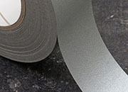 legatoria NastroAutoadesivo bordaDorso, 30mm, GRIGIO nastro speciale in carta telata per ricoprire il dorso di blocchi pinzati. Elegante effetto tessuto, spessore 200 micron. Utilizzato nelle industrie grafiche per bordature e dorsature di libri, registri, quaderni, blocchi per assegni e formulari.