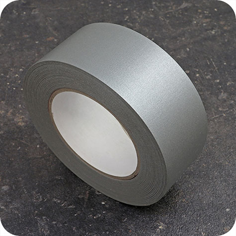 legatoria NastroAutoadesivo bordaDorso, 50mm, GRIGIO nastro speciale in carta telata per ricoprire il dorso di blocchi pinzati. Elegante effetto tessuto, spessore 200 micron. Utilizzato nelle industrie grafiche per bordature e dorsature di libri, registri, quaderni, blocchi per assegni e formulari.