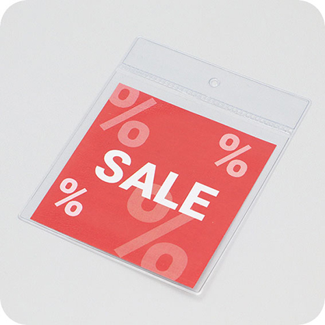 legatoria Busta U. foro. 80x80mm TRASPARENTE, con lato sporgente e con foro da 5mm per l�appensione, in PCV morbido da 140 micron, aperta sul lato corto. Formato esterno 90x90mm. Senza patella di chiusura.