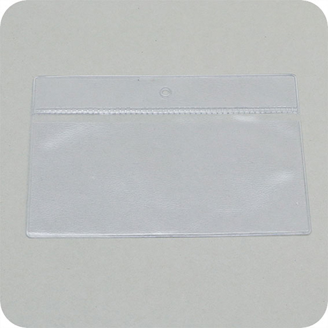 legatoria Busta U. foro. 105x50mm TRASPARENTE, con lato sporgente e con foro da 5mm per lappensione, in PCV morbido da 140 micron, aperta sul lato corto. Formato esterno 114x60mm. Senza patella di chiusura.
