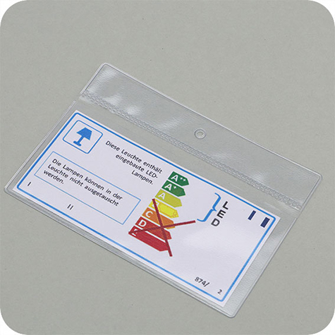 legatoria Busta U. foro. 105x50mm TRASPARENTE, con lato sporgente e con foro da 5mm per lappensione, in PCV morbido da 140 micron, aperta sul lato corto. Formato esterno 114x60mm. Senza patella di chiusura.