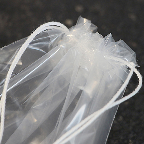 legatoria Sacchetto chiusura a laccio, 170x250mm TRASPARENTE, in polietilene da 50 micron, aperto sul lato corto.