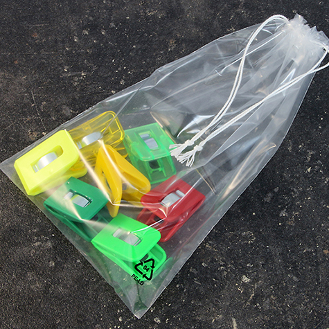 legatoria Sacchetto chiusura a laccio, 170x250mm TRASPARENTE, in polietilene da 50 micron, aperto sul lato corto.