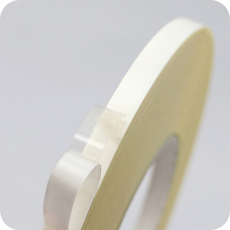 legatoria Nastro biadesivo, alte prestazioni, 9mm TRASARENTE, ALTE PRESTAZIONI, in PET adesivo permanente da entrambi i lati, in rotolo da 50m.