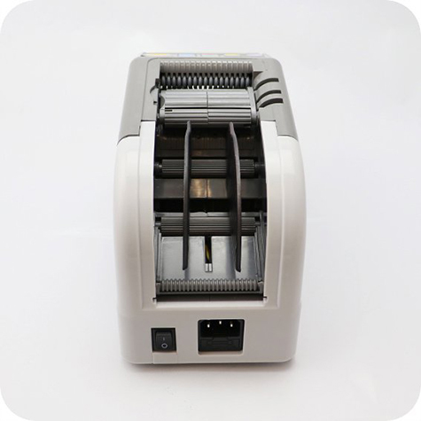 legatoria Dispenser elettronico, nastri adesivi  Programmabile. Display digitale. Cassetto di apertura per pulirlo facilmente. Monta 2 rotoli di nastro contemporaneamente. Utilizzabile per nastri mono e bi-adesivi larghi da 6 a 60mm. Lunghezze programmabili da 5 a 999mm.