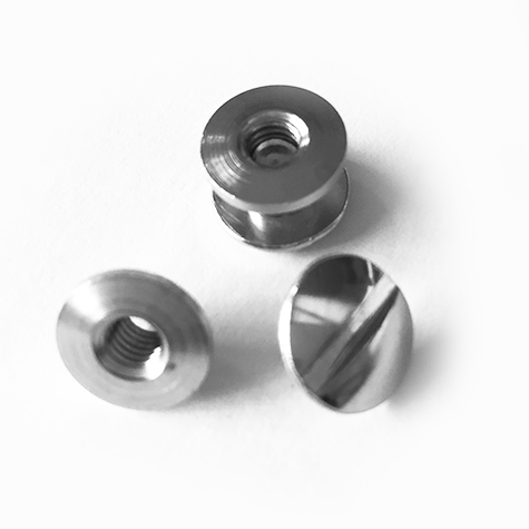 legatoria Viti sepolte rilegatura, NICHELATE, 3,5mm lunghezza mm 3,5, testa diametro 10mm, tubetto diametro 5mm, una testa fissa ed una mobile. Per lunghezza, si intende la distanza INTERNA tra le due teste, che corrisponde allo spessore del volume da rilegare.