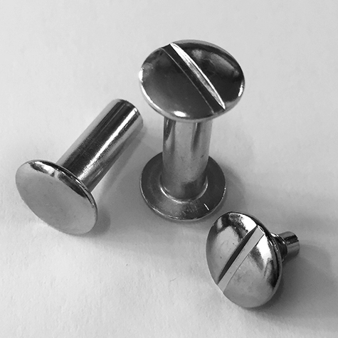 legatoria Viti sepolte rilegatura, NICHELATE, 15mm lunghezza mm 15, testa diametro 10mm, tubetto diametro 5mm, una testa fissa ed una mobile. Per lunghezza, si intende la distanza INTERNA tra le due teste, che corrisponde allo spessore del volume da rilegare.