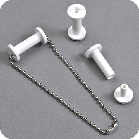 legatoria Viti sepolte forate BIANCHE 10mm  lunghezza 10 mm, diametro testa 12mm, diametro tubetto 6mm, foro interno 3mm, una testa fissa ed una mobile. Per lunghezza, si intende la distanza INTERNA tra le due teste, che corrisponde allo spessore del volume da rilegare.