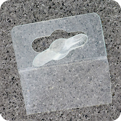 legatoria Appendini trasparenti autoadesivi per blister 47x50mm foratura standard europea. In PET trasparente flessibile da 400 micron, per oggetti fino a 300 grammi. In rotolo.