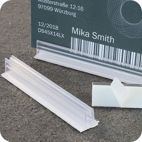 legatoria Porta cartellino autoadesivo 75x120mm TRASPARENTE, angolo di 90 gradi. Con base autoadesiva in schiuma di polietilene.