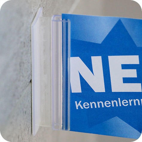 legatoria Porta cartellino autoadesivo flessibile 15x25mm TRASPARENTE, angolo di 90 gradi. Con base autoadesiva in schiuma di polietilene.