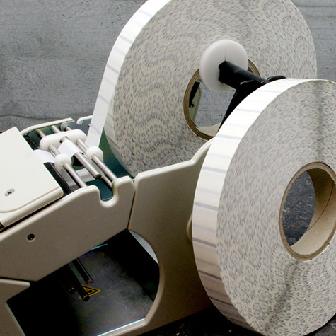 legatoria Bollini BlackMark diametro 25mm TRASPARENTI, adesivo permanente, in rotolo, con perforazione per la rottura del bollino se si tenta di rimuoverlo.