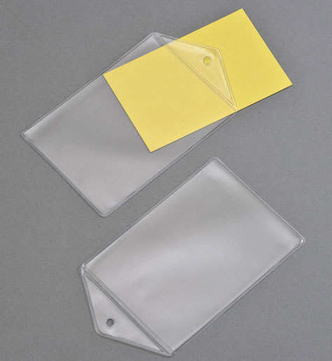 legatoria Portatesserino, A7 (80x110mm) TRASPARENTE, aperta sul lato corto, con lato sporgente di 20mm con foro circolare, in PVC morbido da 180 micron, formato A7 (80x110mm), (110x80mm).