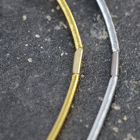 legatoria Anello elastico rivestito in tessuto, 410mm ORO, spessore 2mm, le due estremit sono congiunte con una chiusura metallica per formare un anello che ben si adatta a rilegare fogli formato A5 (210mm).