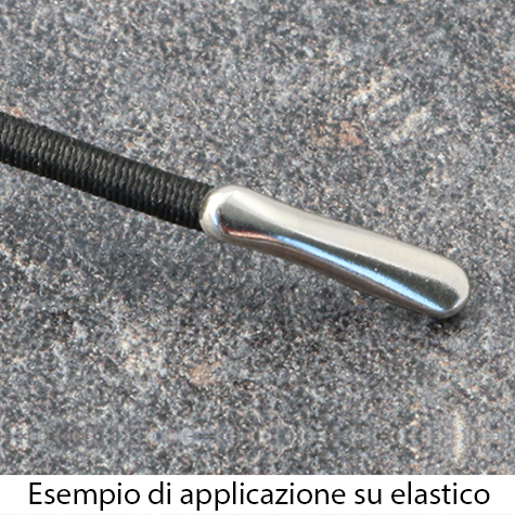 legatoria Capicorda a -T- per elastico o cordoncino NICHELATO, lunghezza 14,3mm. Larghezza 3,2mm. Spessore 3,5mm. Per elastico di spessore fino a 3mm..