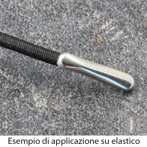 legatoria Capicorda a -T- per elastico o cordoncino NICHELATO, lunghezza 15,4mm. Larghezza 6,3mm. Spessore 6,5mm. Per elastico di spessore fino a 5 mm..