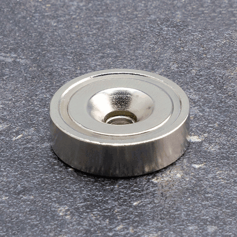 legatoria Magnete con foro svasato, 25mm NICHELATO, in metallo, con magnete al neodimio N38. Diametro: 25mm, altezza: 5mm, larghezza foro: 5.5-11.7mm (forza di attrazione:19kg).