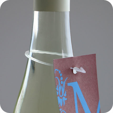 legatoria Anello per bottiglie TRAPARENTE, in plastica, diametro 40mm. L’anello per bottiglie serve per applicare piccoli opuscoli sul collo delle bottiglie.