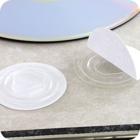 legatoria Porta CD a bottone autoadesivo TRASPARENTE, diametro 35mm, in plastica con linguetta.