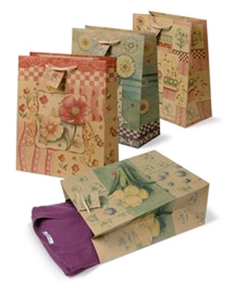 gbc Shopper in carta riciclata 26x32,7cm, spessore 13cm con decorazioni floreali.