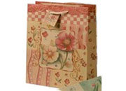 gbc Shopper in carta riciclata 26x32,7cm, spessore 13cm con decorazioni floreali.