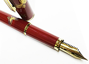 gbc Penna stilografica OSAMA FARFALLE ROSSA Pennino Iridium Point Germany originale. Fusto in resina acrilica ROSSA con decorazione farfalle., placcata in oro. Da collezione, Dimensioni: 15x130mm. completa di astuccio in velluto OSA16