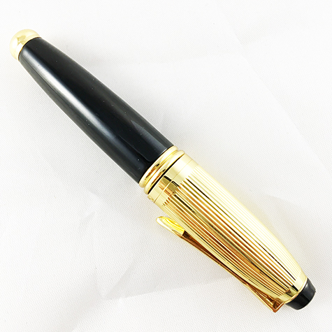 gbc Penna stilografica mini OSAMA NERO-ORO Pennino Iridium Point Germany originale. Fusto in resina acrilica, placcata in oro. Da collezione, Dimensioni: 15x100mm. completa di astuccio.