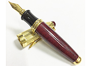 gbc Penna stilografica mini OSAMA BORDO'-ORO Pennino Iridium Point Germany originale. Fusto in resina acrilica, placcata in oro. Da collezione, Dimensioni: 15x100mm. completa di astuccio OSA6