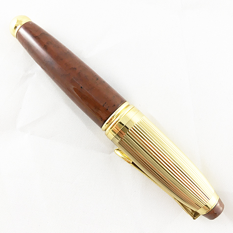 gbc Penna stilografica mini OSAMA BRUNO-ORO Pennino Iridium Point Germany originale. Fusto in resina acrilica, placcata in oro. Da collezione, Dimensioni: 15x100mm. completa di astuccio.