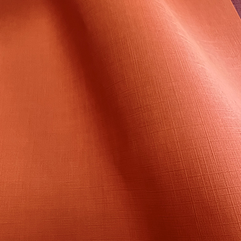 legatoria SimilTELA Bicolore, bb200 ARANCIO in rotoli altezza 53cm, 200 grammi-mq, per rilegatura, legatoria, cartonaggio specifica per stampa transfer con termopressa.