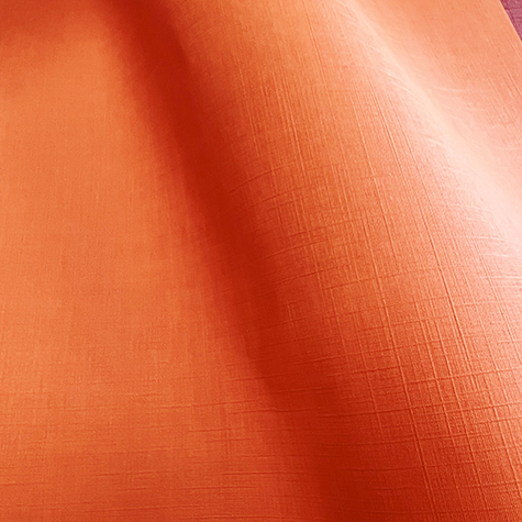 legatoria SimilTELA Bicolore, bb200 ARANCIO in rotoli altezza 107cm, 200 grammi-mq, per rilegatura, legatoria, cartonaggio specifica per stampa transfer con termopressa .