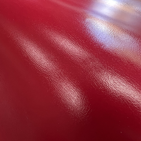 legatoria  EcopelleTintaUnita VenaturaMedia, c2400 ROSSO in rotoli altezza 54cm, 210 grammi-mq, per rilegatura, legatoria, cartonaggio .